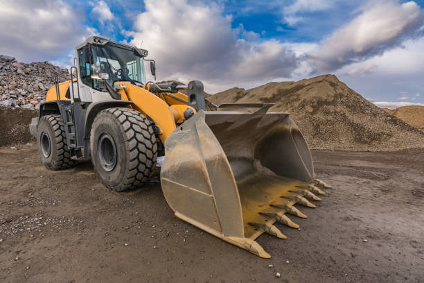 istock Excavator moving gravel and stone in a quarry 1188850401