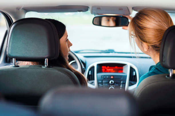istock Teenager Having Driving Lesson With Female Instructor 1188853405