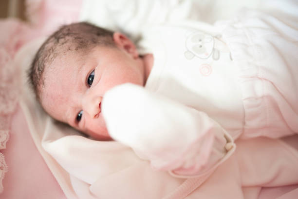 istock Newborn baby girl 1188853436