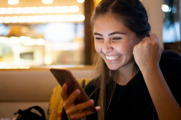 istock Young woman using smart phone 1188855762