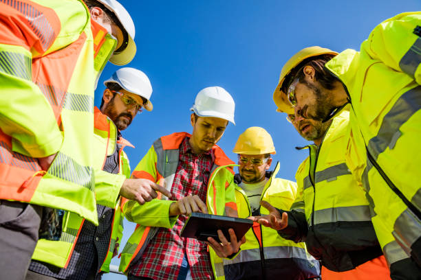istock Engineers and workers assessing wastewater plant performance 1188857958