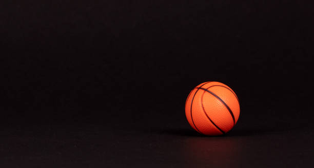 istock Single small rubber toy in form of basketball 1188862901