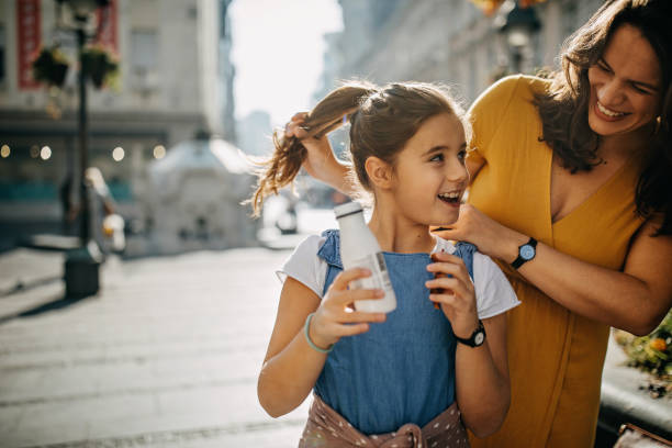 istock Mother daughter eating outdoor 1188863235
