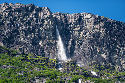 Vinnufossen, a beautiful waterfall flushing down a mountainside in Sunndal,  Norway. The tallest waterfall in Europe and the sixth tallest in the world, 865m or 2,838 ft