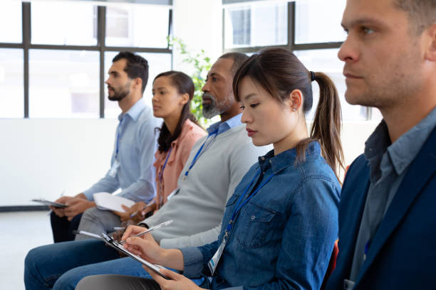 istock Business professionals at a conference 1188866657
