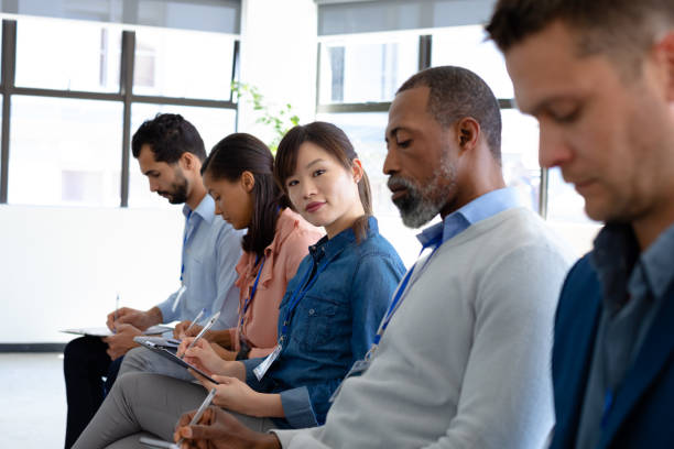 istock Business professionals at a conference 1188866696