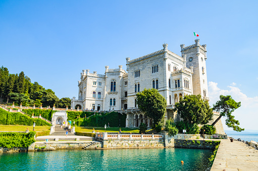 Triest, Italy - 05.08.2015 View on Miramare castle on the gulf of Trieste on northeastern Italy. Tourist spot, famous travel destination