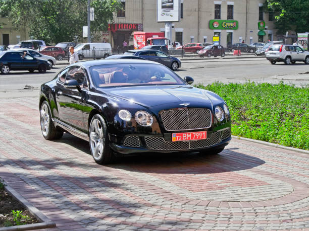 Black luxury car Bentley Continental GT in the city stock photo