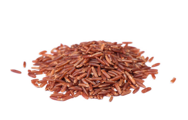 istock Heap of raw dry brown rice 1188872017