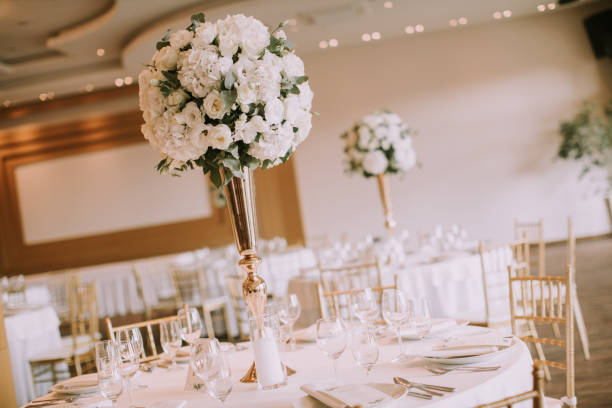 istock Wedding banquet tables with flowers decoration 1188873884