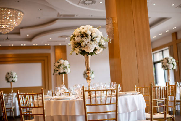 istock Wedding banquet tables with flowers decoration 1188873890