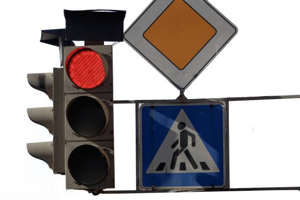 istock red traffic lights and road signs 1188874846
