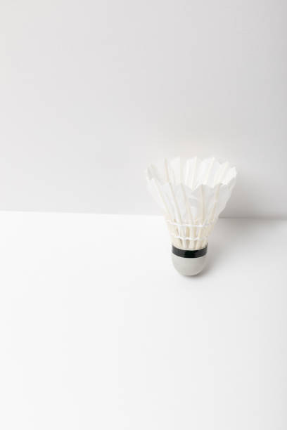 istock white light badminton shuttlecock on white background with copy space 1188875786