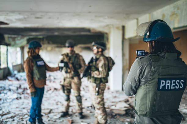 istock Military men giving interview from the war zone 1188876902