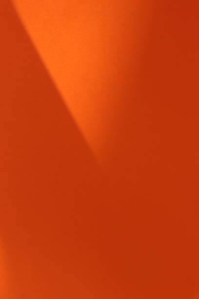 istock Beautiful orange background with light and shadow effects. Trend concept. Empty background. 1188878697