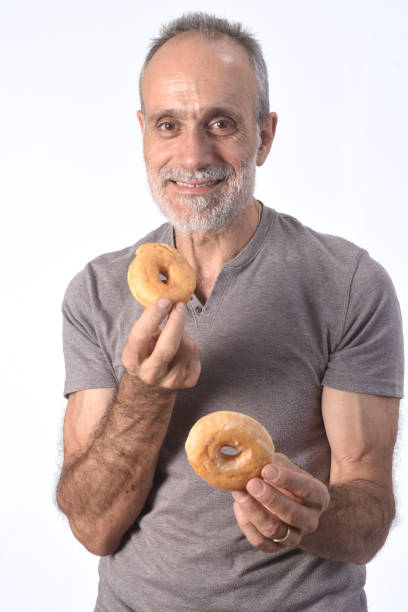 istock man with food on white background 1188879032