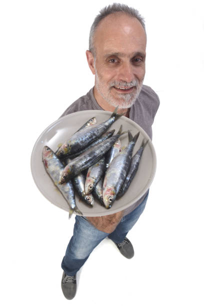 man with food on white background