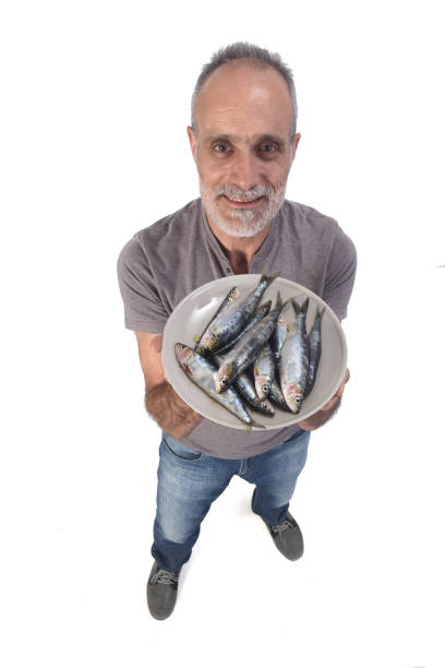 man with food on white background