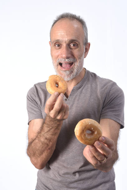 istock man with food on white background 1188879675