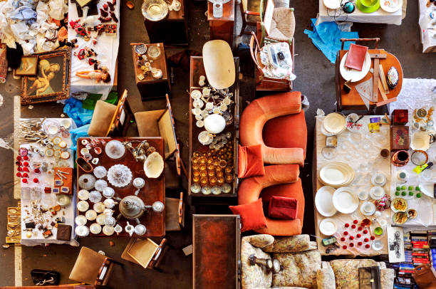bits and pieces in a flea market high-angle shot of a stall in a flea market full of bits and pieces fashion bazaar stock pictures, royalty-free photos & images