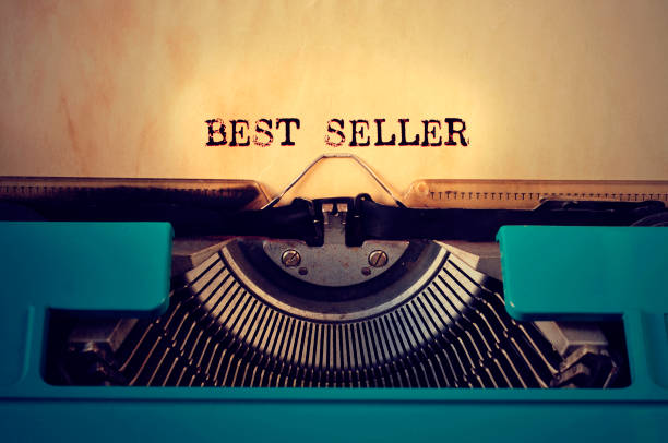 retrò typewritter e testo best seller scritto con esso - bestseller foto e immagini stock