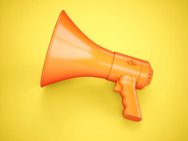 istock 3D Rendering Orange Megaphone isolated on yellow background 1188883412