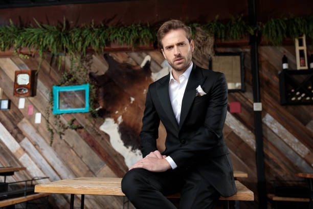 istock Bothered groom frowning and holding both hands on his leg 1188883522