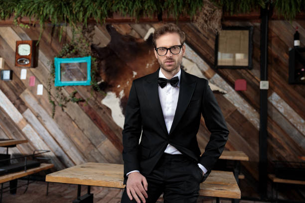 istock Serious looking groom holding his hand in his pocket 1188883795