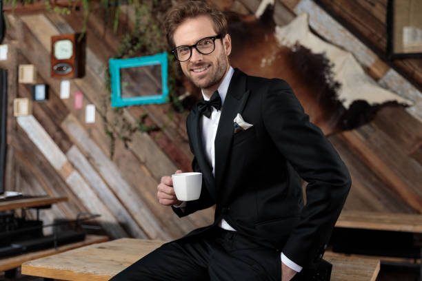 istock Happy fashion model holding a coffee cup and smiling 1188884505