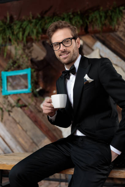 istock Confident fashion model holding a coffee cup 1188884535