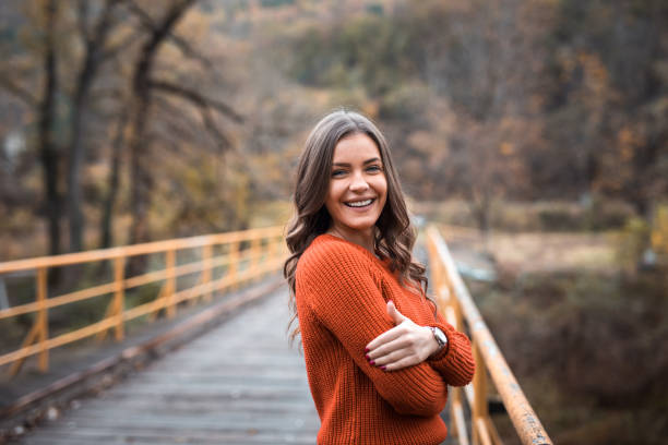 istock Smiling young lady in autumn colors 1188884965
