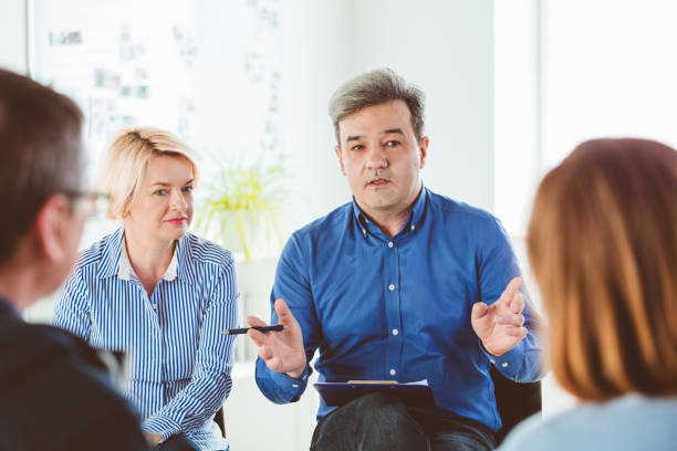 istock Coach motivating and giving advice to patients 1188885387