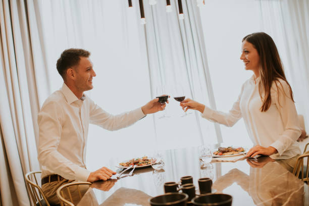 istock Sweet couple having a romantic dinner at luxury kitchen 1188887523