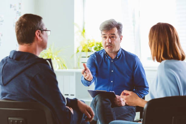 istock Psychotherapist talking with troubled couple 1188888467