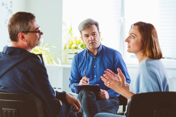 istock Therapist looking at couple arguing during meeting 1188889252