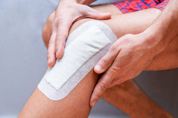 istock medical plaster is glued to the knee 1188893375