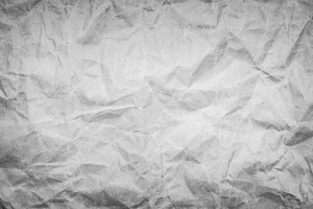 Old white crumpled paper grunge texture background.