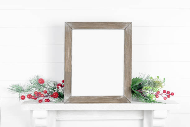 istock Rough wooden frame on a light background with branches of greenery 1188894908