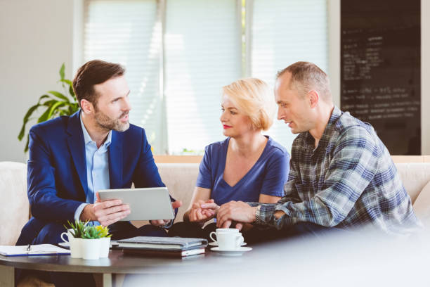 istock Psychotherapist showing digital tablet to patients 1188895937