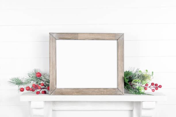 istock Rough wooden frame on a light background with branches of greenery 1188896591