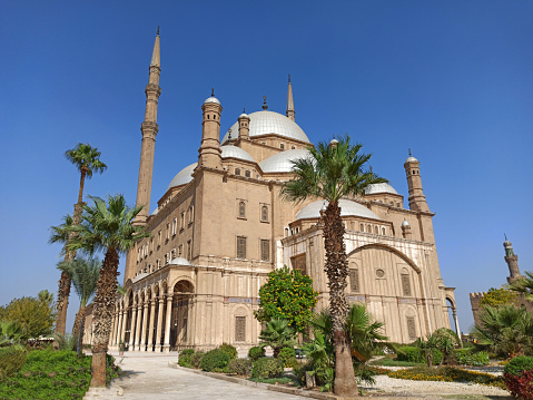 The stunning Alabaster mosque- Muhammad Ali mosque at Saladin citadel surrounded by unique plants garden and bushes - Cairo Egypt