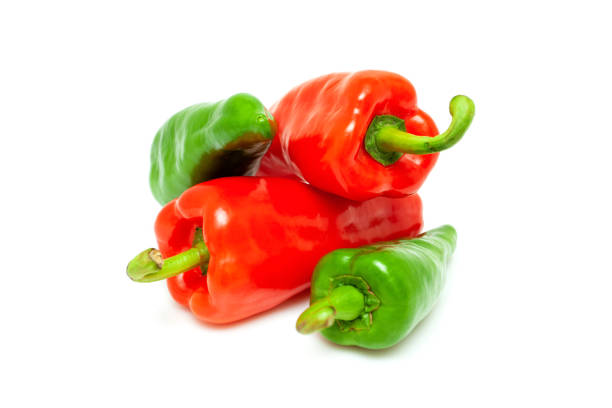 Green peppers on white background
