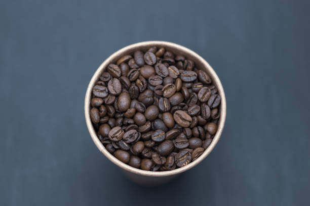 istock coffee beans in a glass on a dark background place for text 1188898806