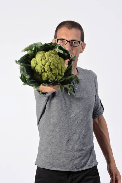 istock man with food on white background 1188899550