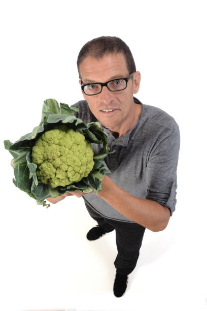 istock man with food on white background 1188899692