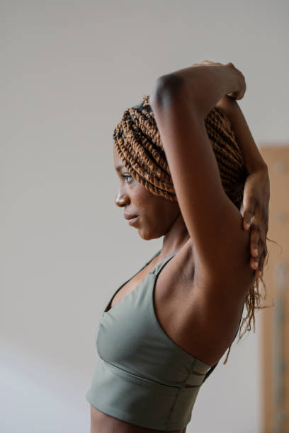 istock Sportswoman Stretching her Arms 1188900766