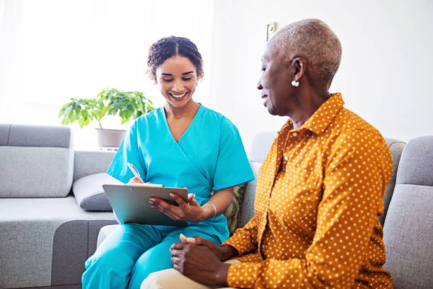 istock Nurse Visiting a Senior Female Patient at Home 1188903014