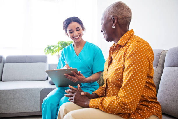 istock Nurse Visiting a Senior Female Patient at Home 1188903029