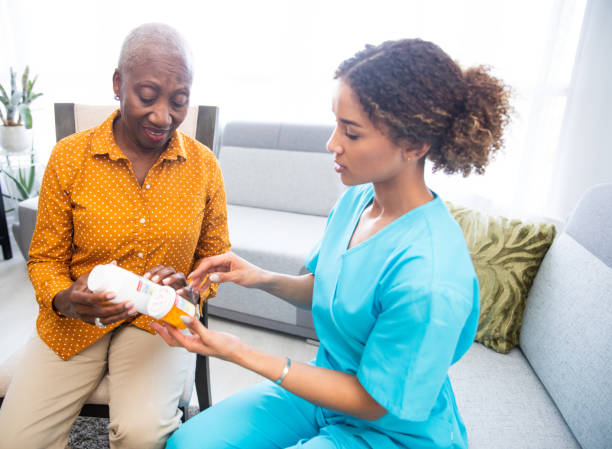 istock Senior Patient Discussing Her Medication With a Nurse 1188903042