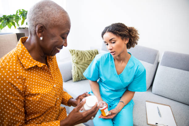 istock Senior Patient Discussing Her Medication With a Nurse 1188903048